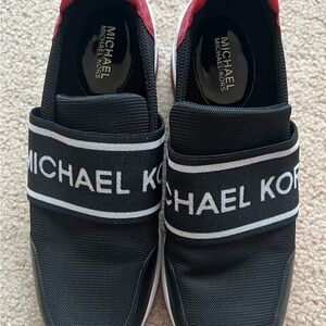 Michael Kors women’s Black red and white Slip-On Sneakers